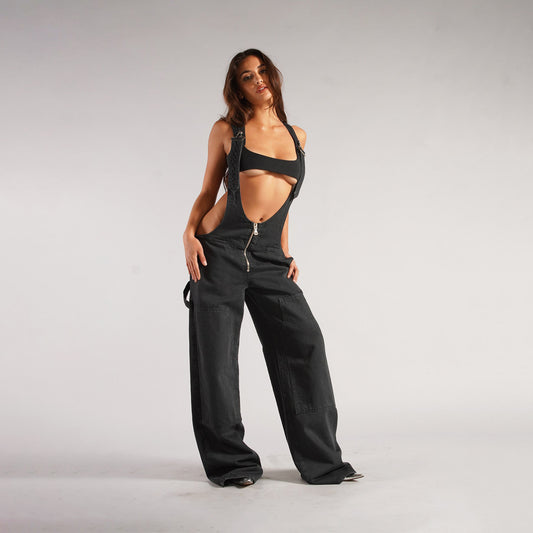 Salopette Y2K femme en jean avec poches et bretelles, style streetwear loose.